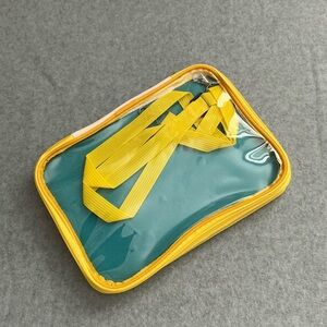 Disney Yellow and Teal Travel Pouch Pinfolio